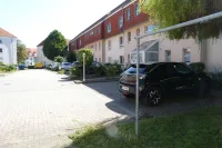 Stellplatz vorm Haus